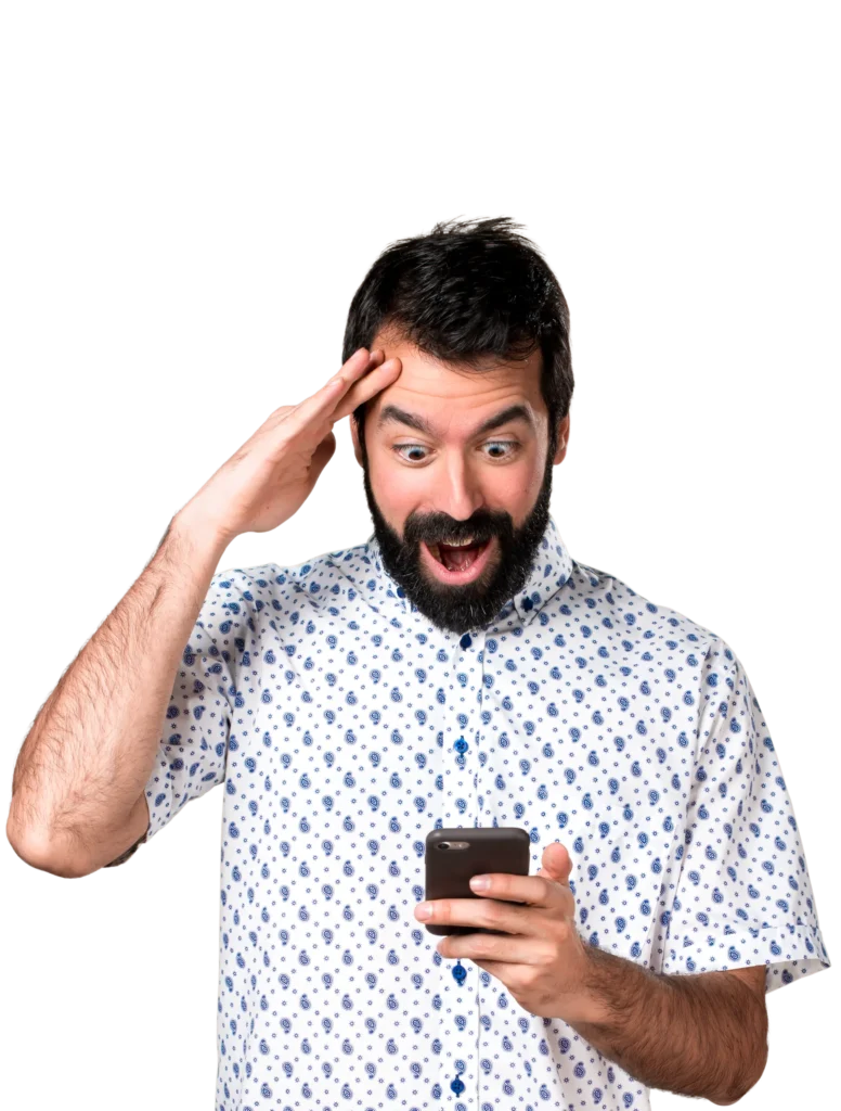Excited man in patterned shirt reacting to phone screen